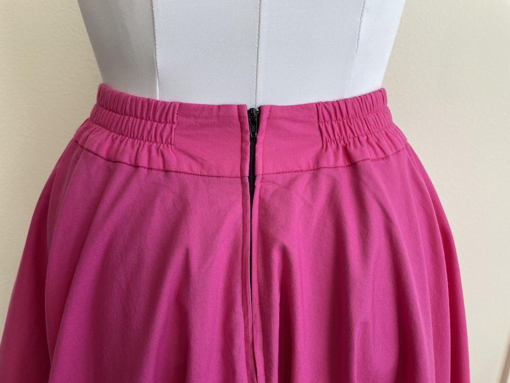 Close up of the back of Luna’s DIY sock hop skirt made with partial elastic waist skirt and zipper back 
