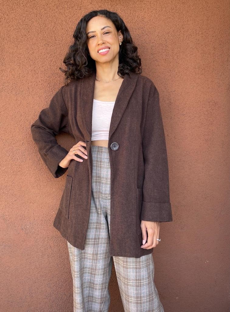 Luna wearing her DIY cardigan coat,  smiling with hand in hip, made from Simplicity S8742 