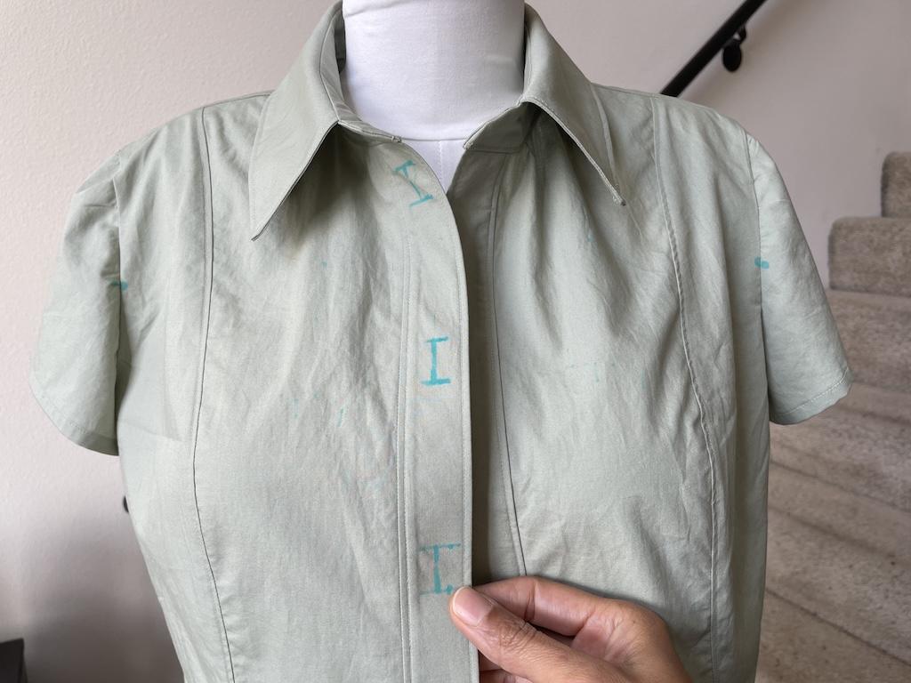 Close-up of button placement markings on Luna’s DIY shirt on the dressform