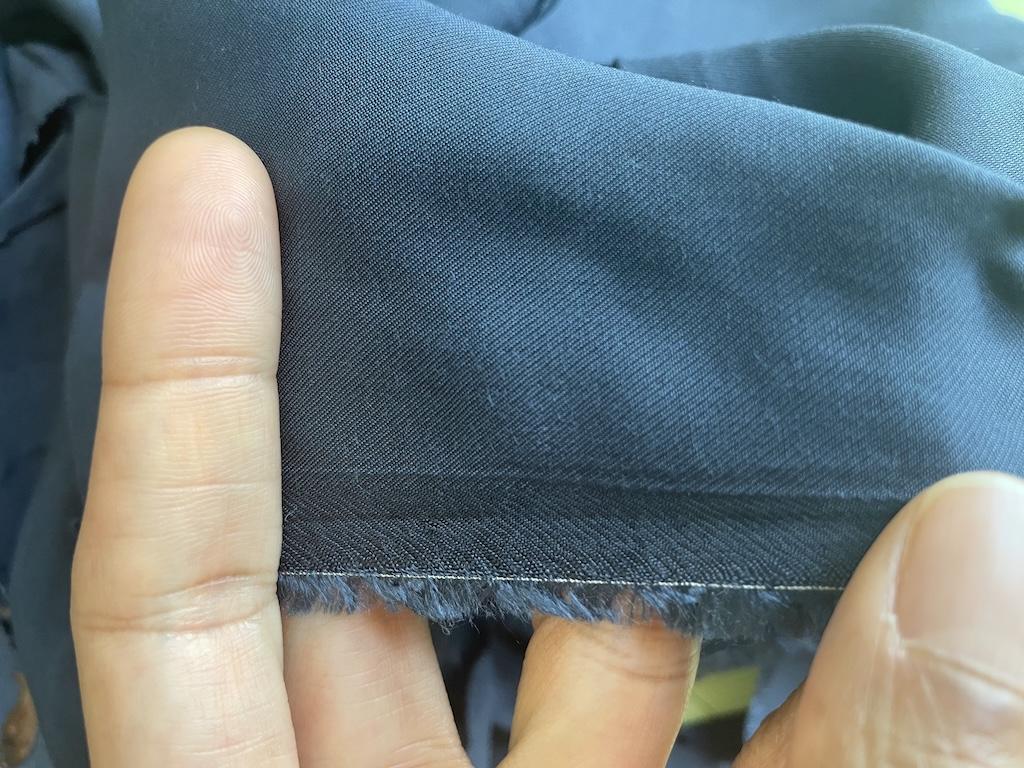 Close up of light weight Tencel twill fabric Luna used for the lining of her empire waist dress