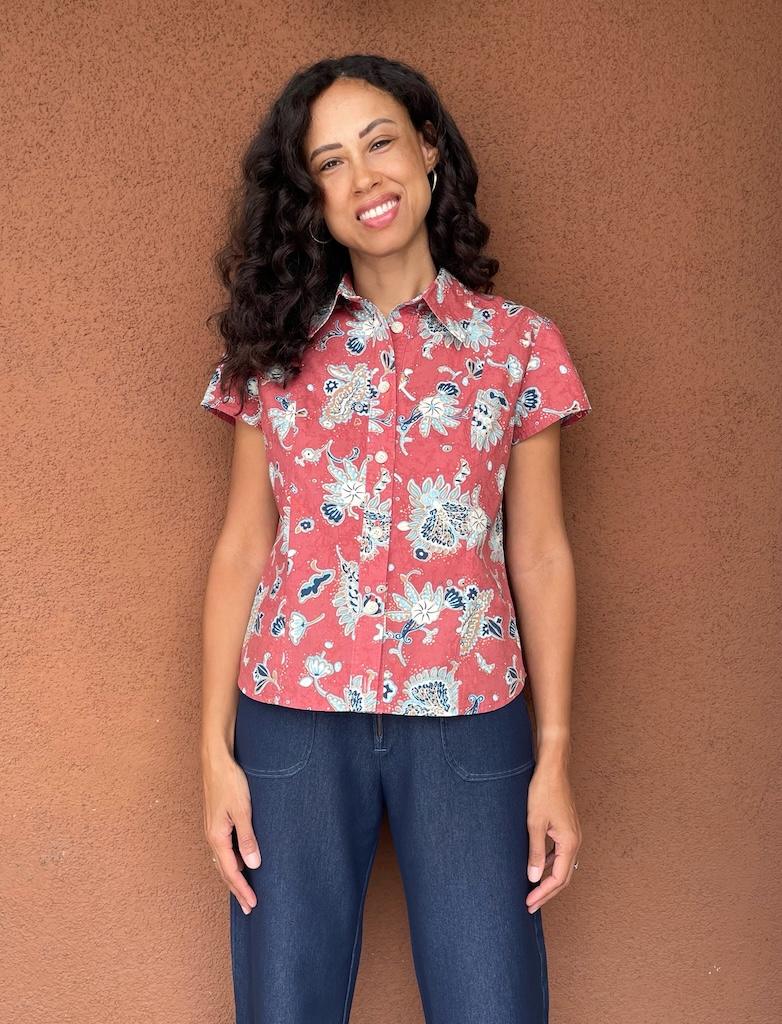 Luna smiling to the camera wearing her button-up shirt made from Simplicity S2447 pattern