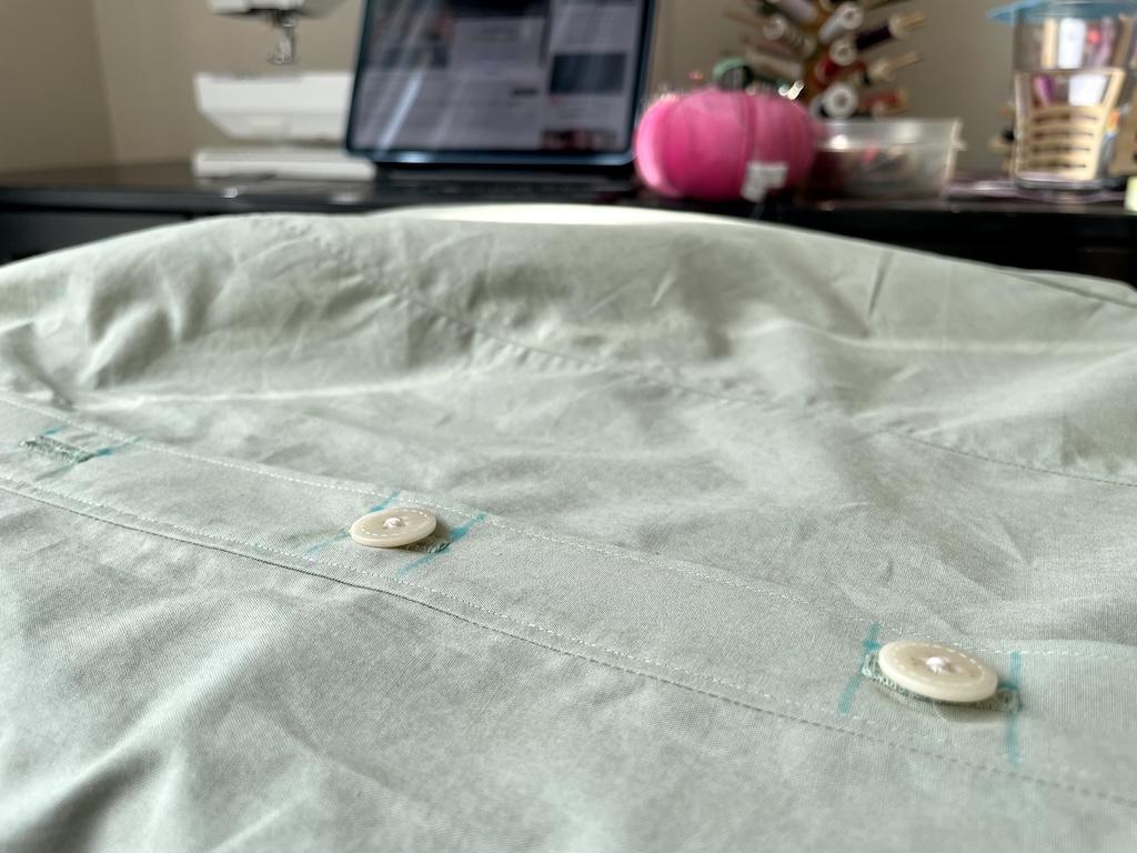 View of buttons on Luna’s DIY shirt that she sewed by hand