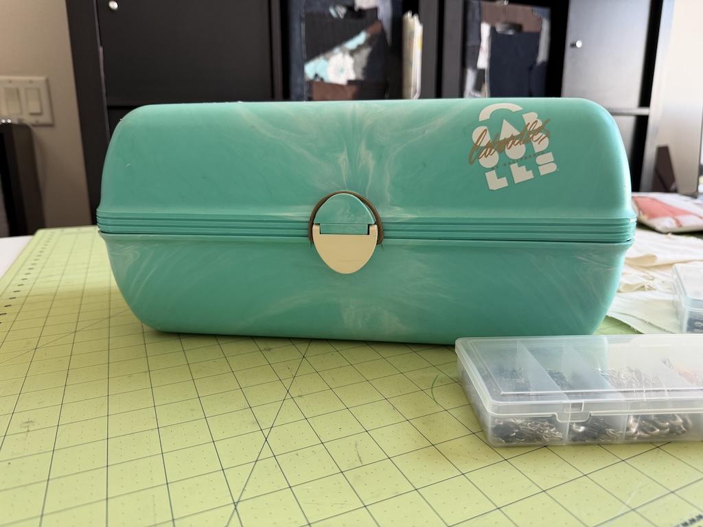 View of Luna’s Caboodles makeup kit that she uses to store ewing supplies