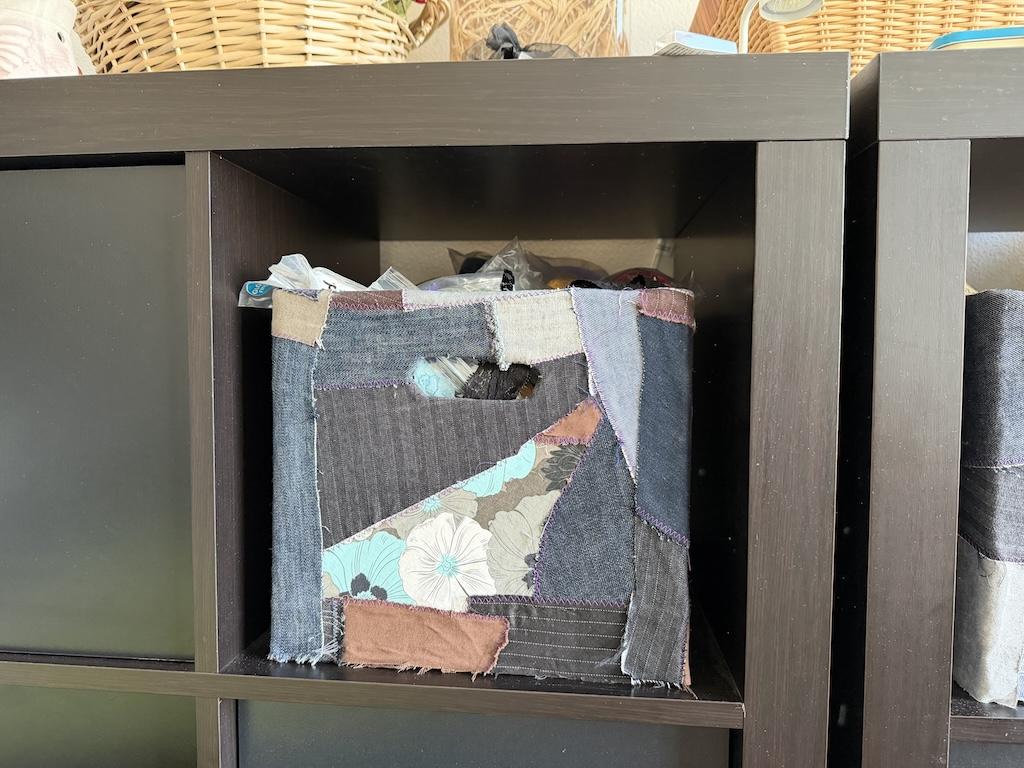 View of Luna’s DIY fabric scrap storage box in her sewing room in cubbie