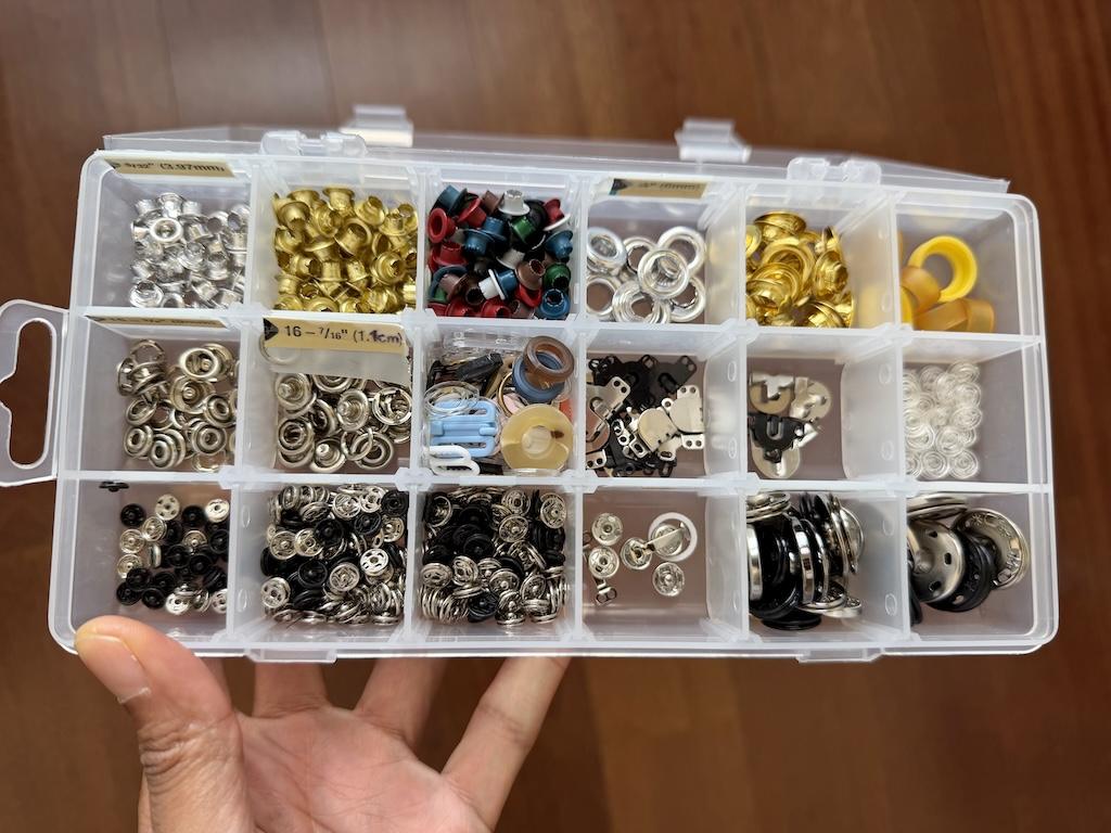 View of sewing notions in Luna’s small divided container