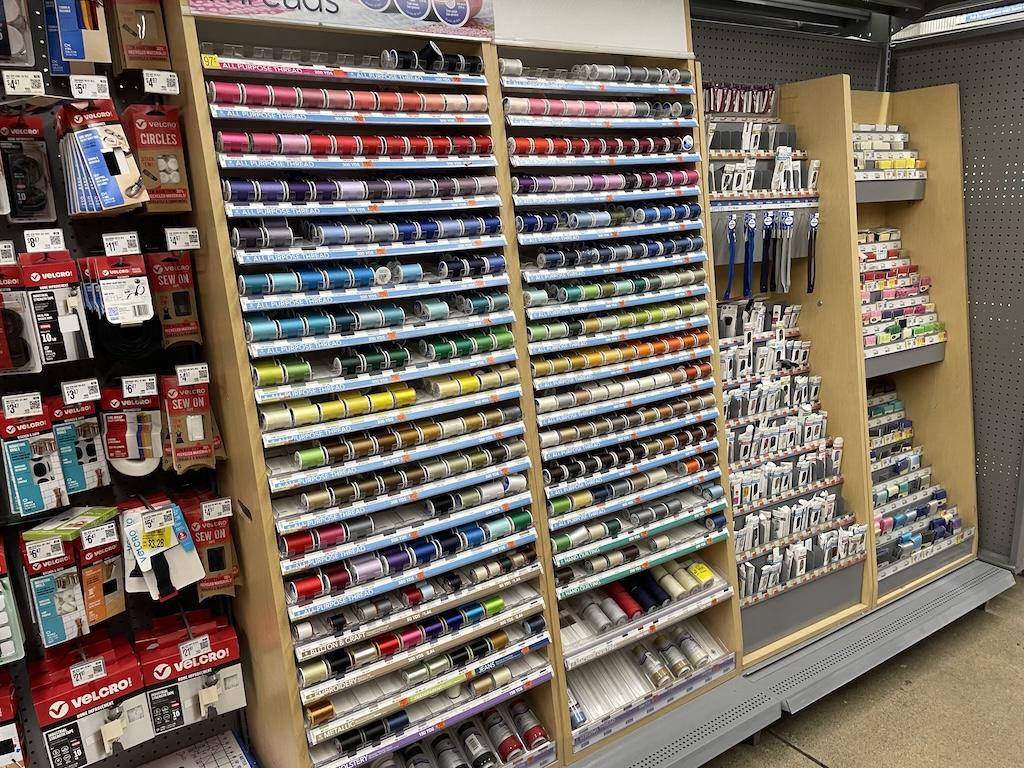 View of thread and zippers that Luna saw in the craft deparment in Walmart