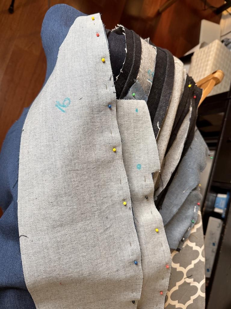 Pattern pieces that Luna cut to make her color blocked denim jacket
