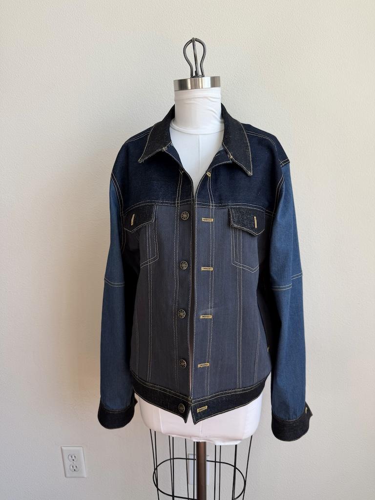 Front view of Luna’s DIY color blocked denim jacket on the dress form, that she made with Simplicity S8845 sewing pattern