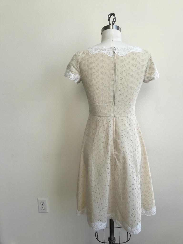 Back view of DIY eyelet dress that Luna made on the dres form