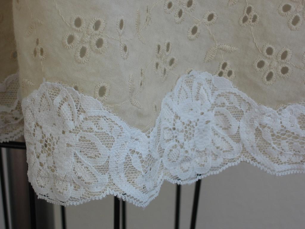 Close up of lace edge on DIY eyelet dress that Luna made