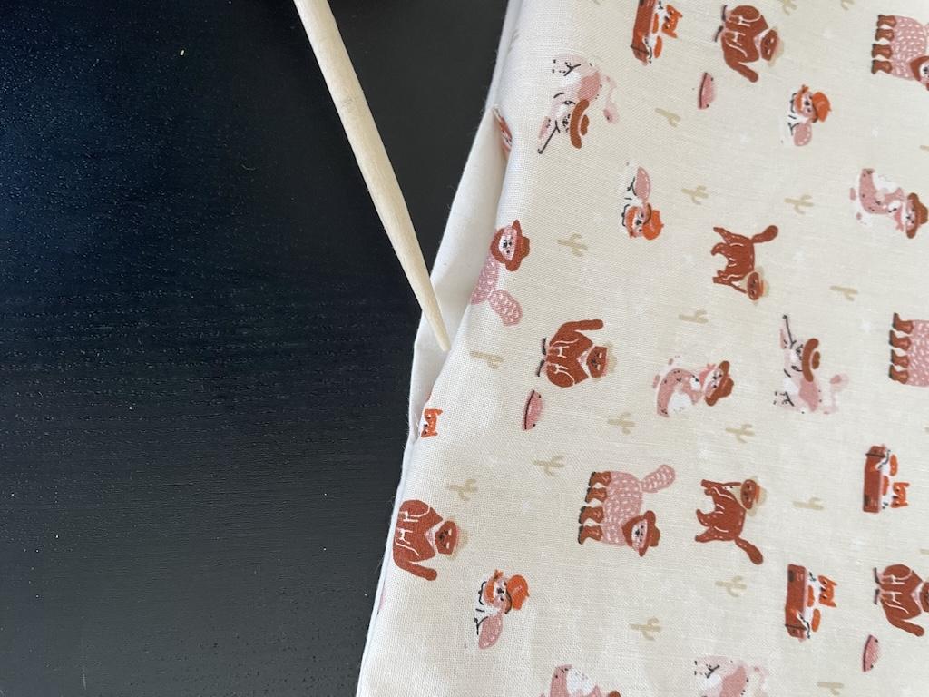 Putting chopstitck into DIY cloth napkin in seam opening