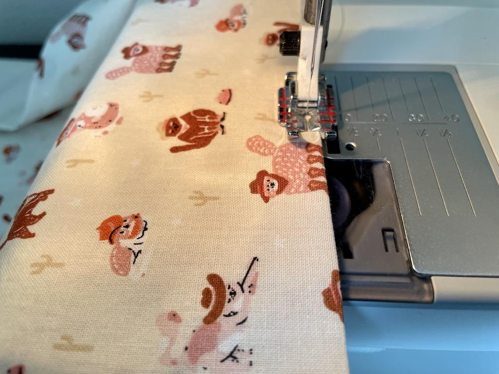 Close up view of topstitching DIY cloth napkin near edge with sewing machine
