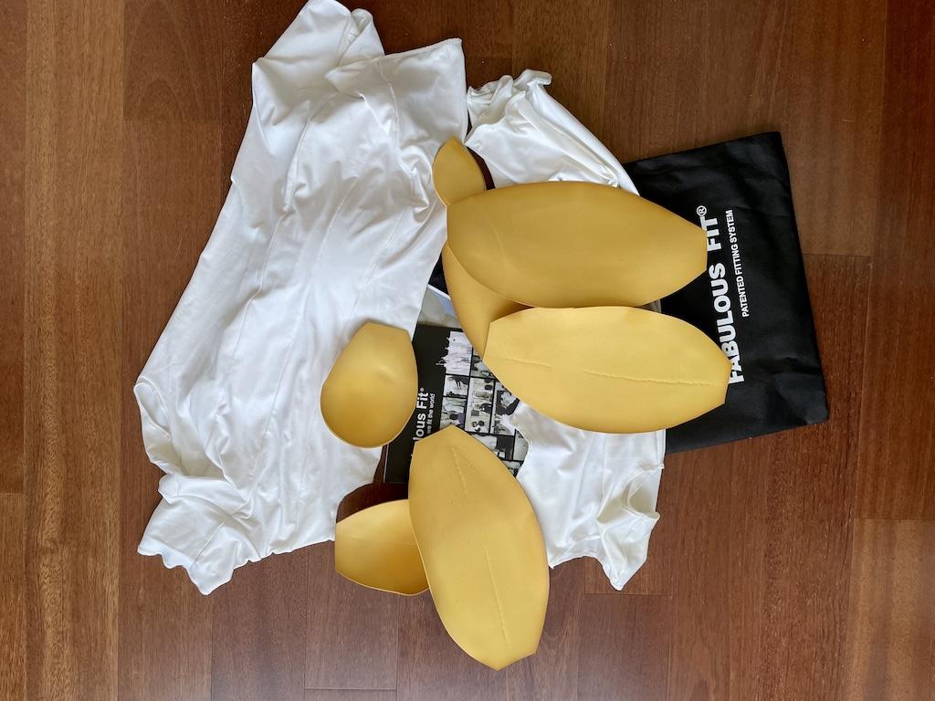 Fabulous Fit Fitting System set that includes two bodysuits, padding, bag, and directions